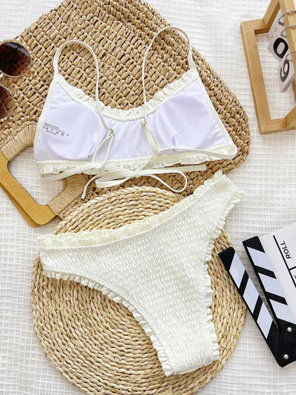 Textured two‑piece swimwear with frill details