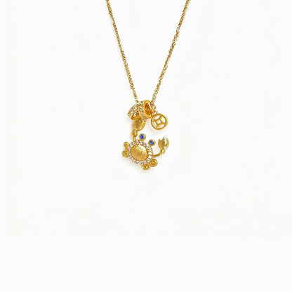 Gold-Plated Crab Pendant Necklace on white backdrop